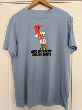 Nike Light Blue Graphic Dri-FIT T-Shirt with Playful Chicken Graphic